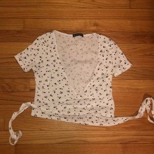 blue flower wrap top